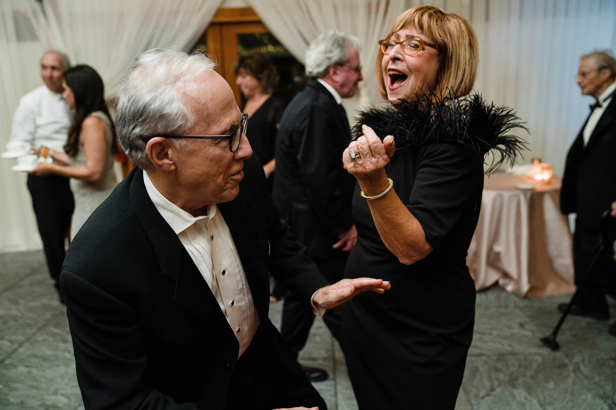 A documentary photograph featured in the best of wedding photography of 2019 showing a couple dancing